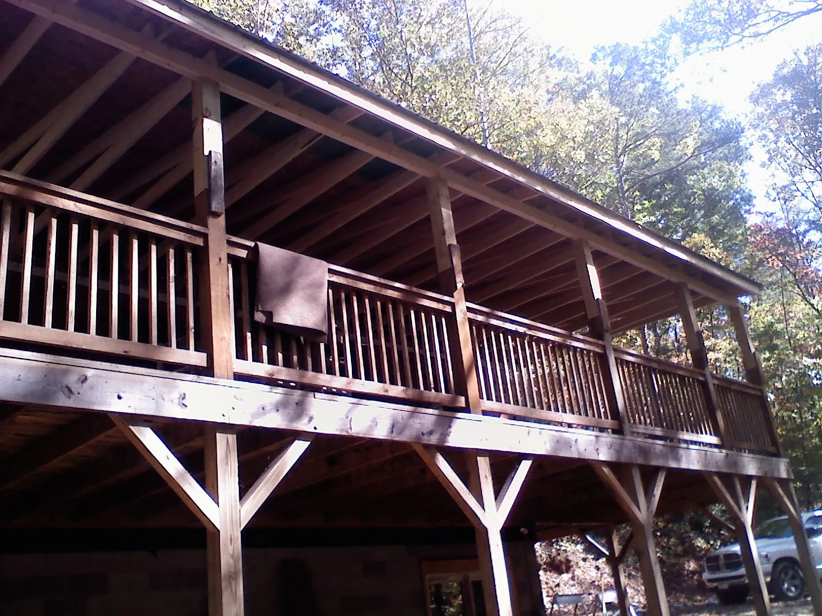 Timber framing under a new elevated porch and deck — Roof Leak Repair in Harrison by Roofing Brothers